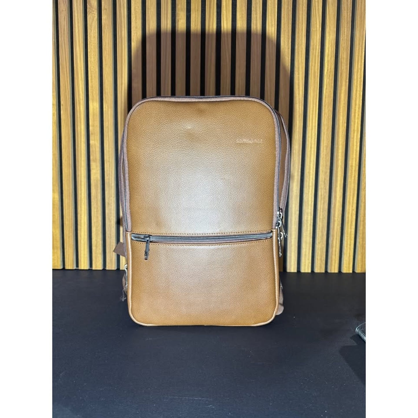 Brown Faux Leather Backpack With Multi-Compartment Design & Durable Straps
