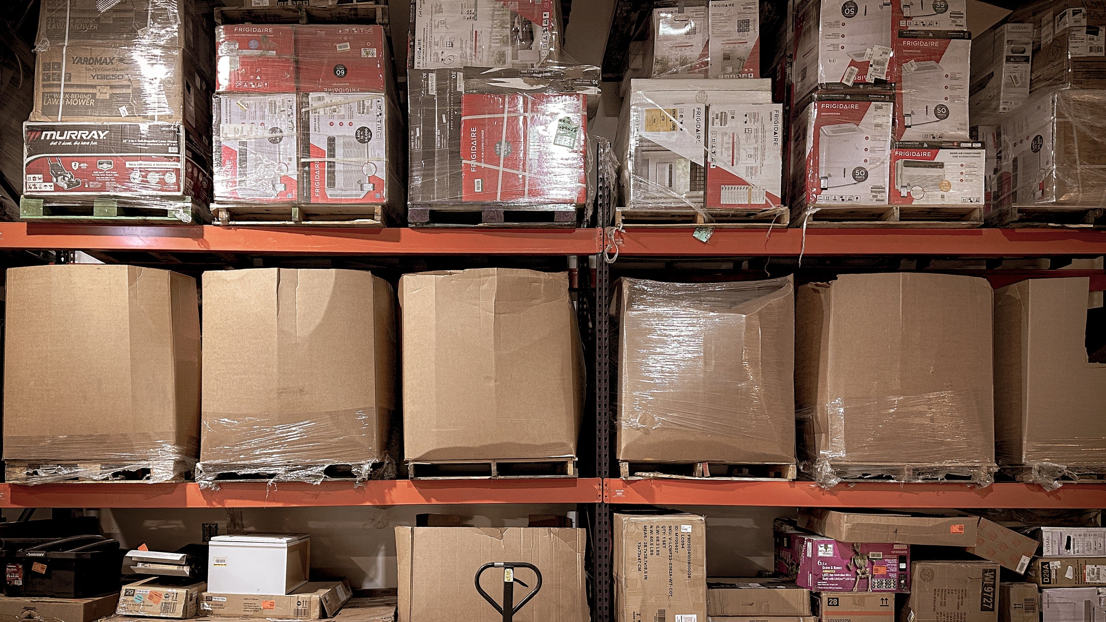 Stacks of cardboard boxes in a warehouse setting